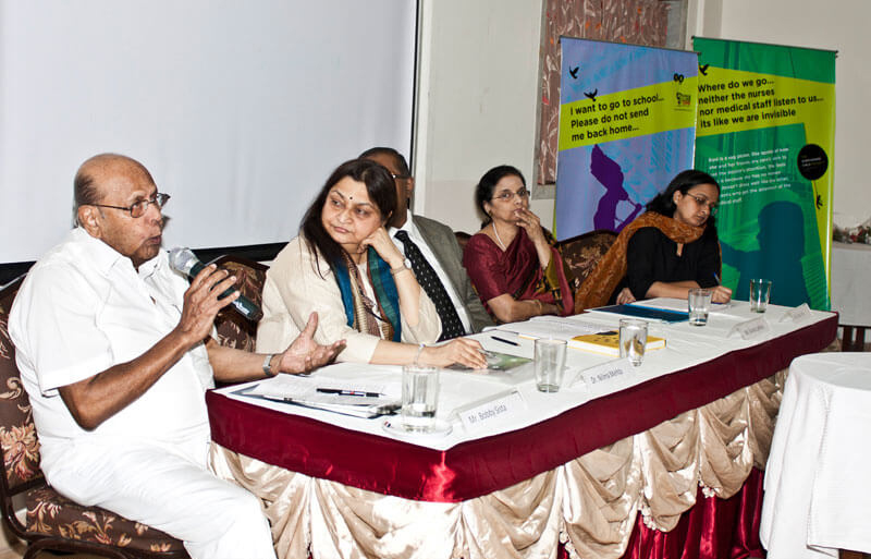 Panel members discussing during a corporate event