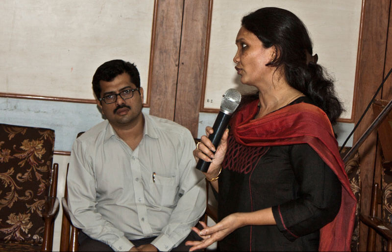 A corporate executive talking at an event