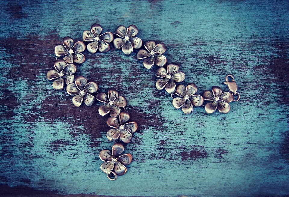 Bracelet on blue table top