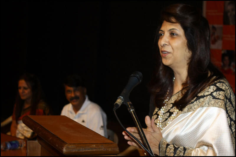 Dr. Indu Shahani delivering a speech at corporate event