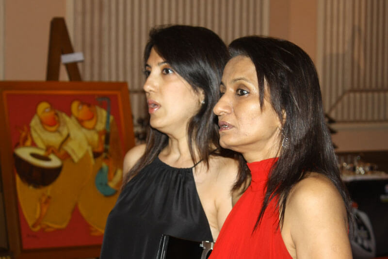 Two women executives at a corporate event
