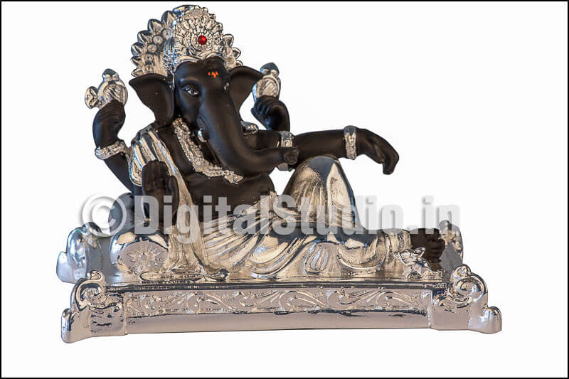 Photograph of  sitting black Ganesha idol