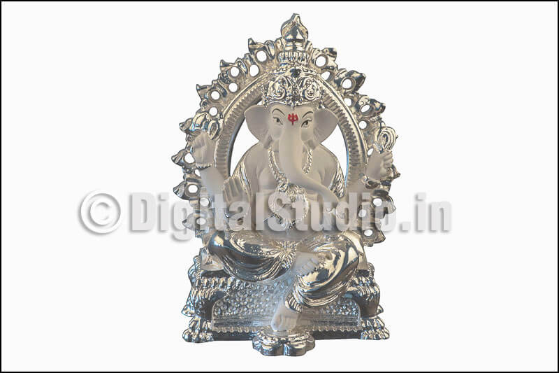 Photograph of  sitting silver Ganehsa idol