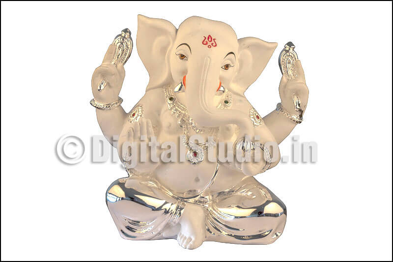 Clay and silver Ganesha idol