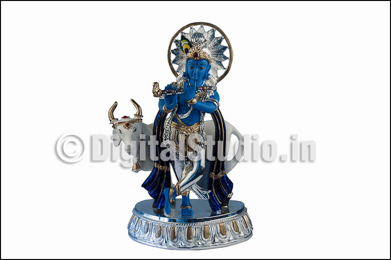 Kirshan idol with cow in standing pose