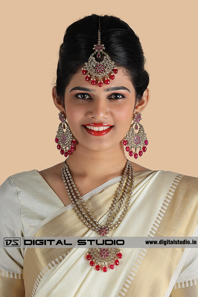 Model with heavy jewellery - front pose