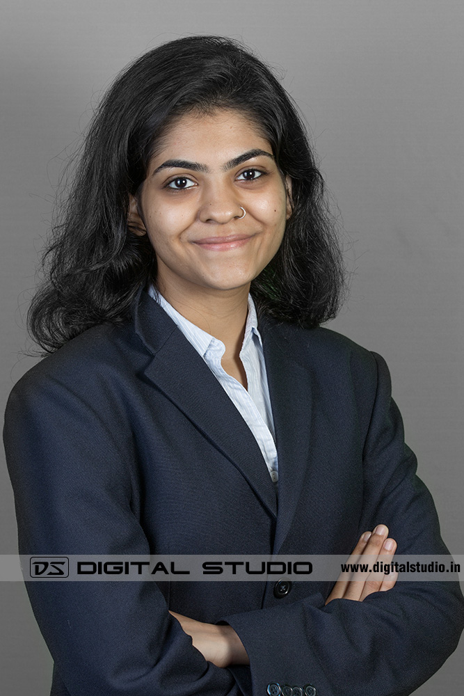 Smiling female executive wearing business suit