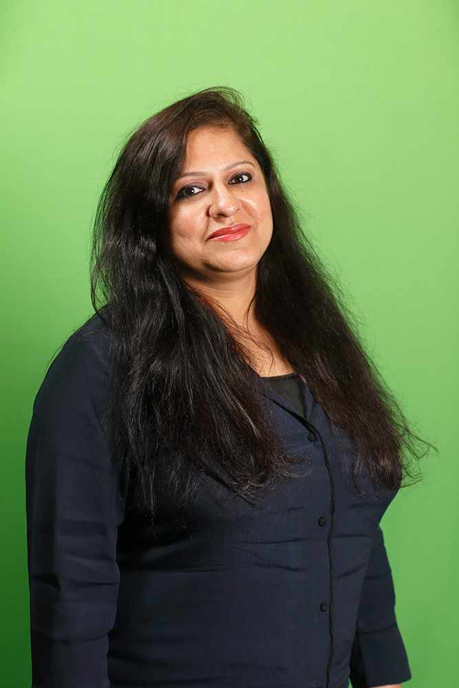 Lady on green background Corporate Headshot