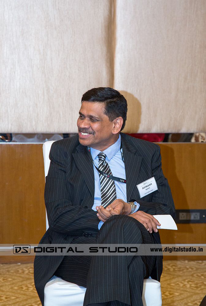 Business owner smiling and listening in the meeting