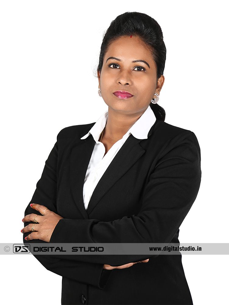 Lady executive with dark blazer white backdrop