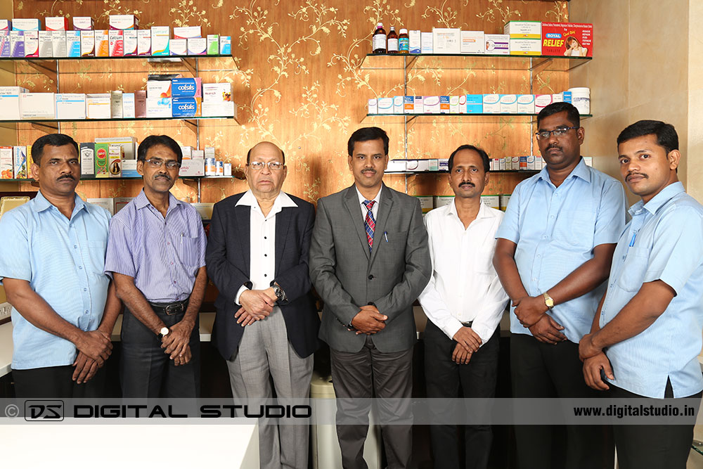 Group photo of top management with office staff