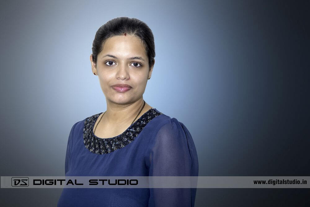 Lady exective in blue dress for Corporate Headshot photography