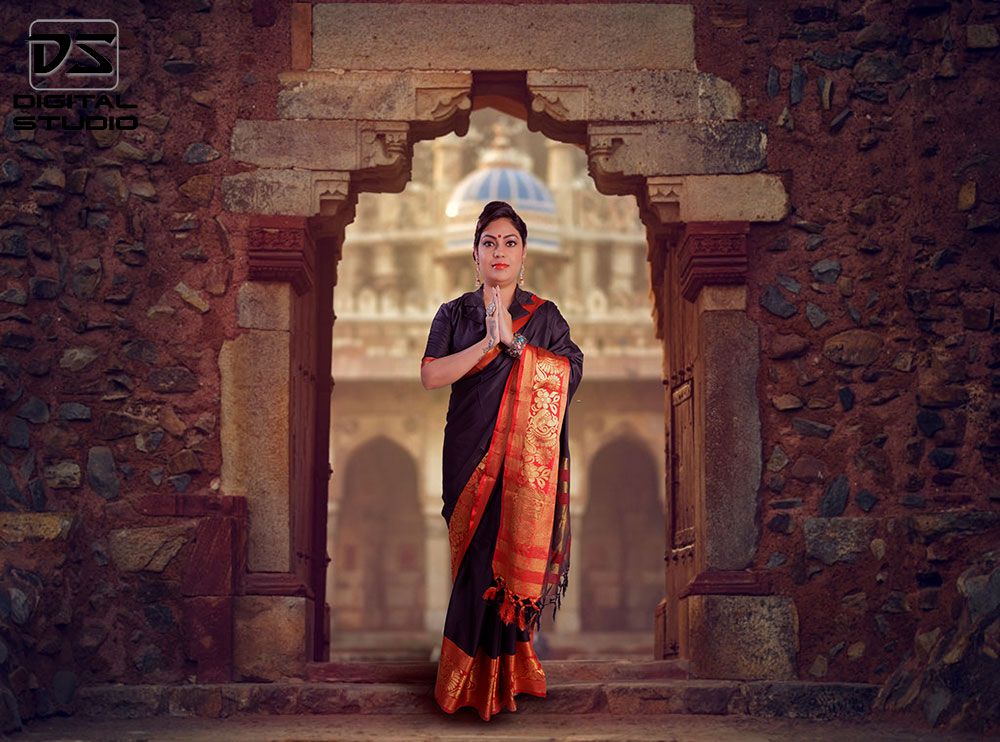 Saree wearing model in front of temple