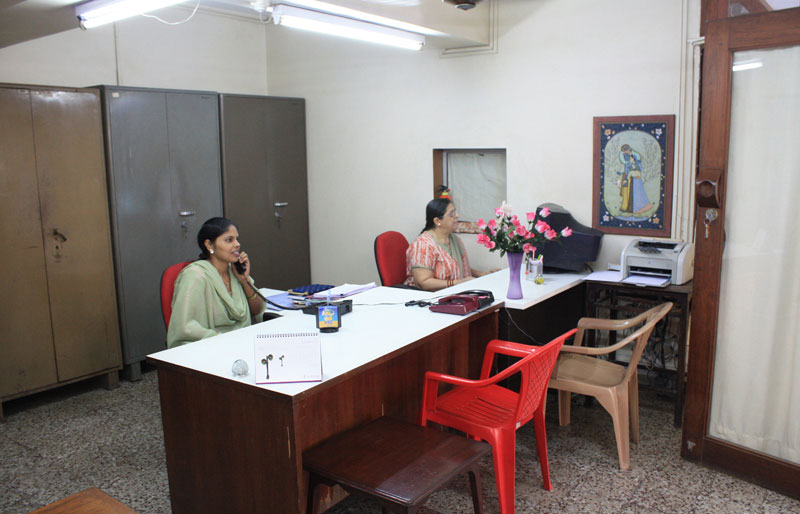 Two office women photograph