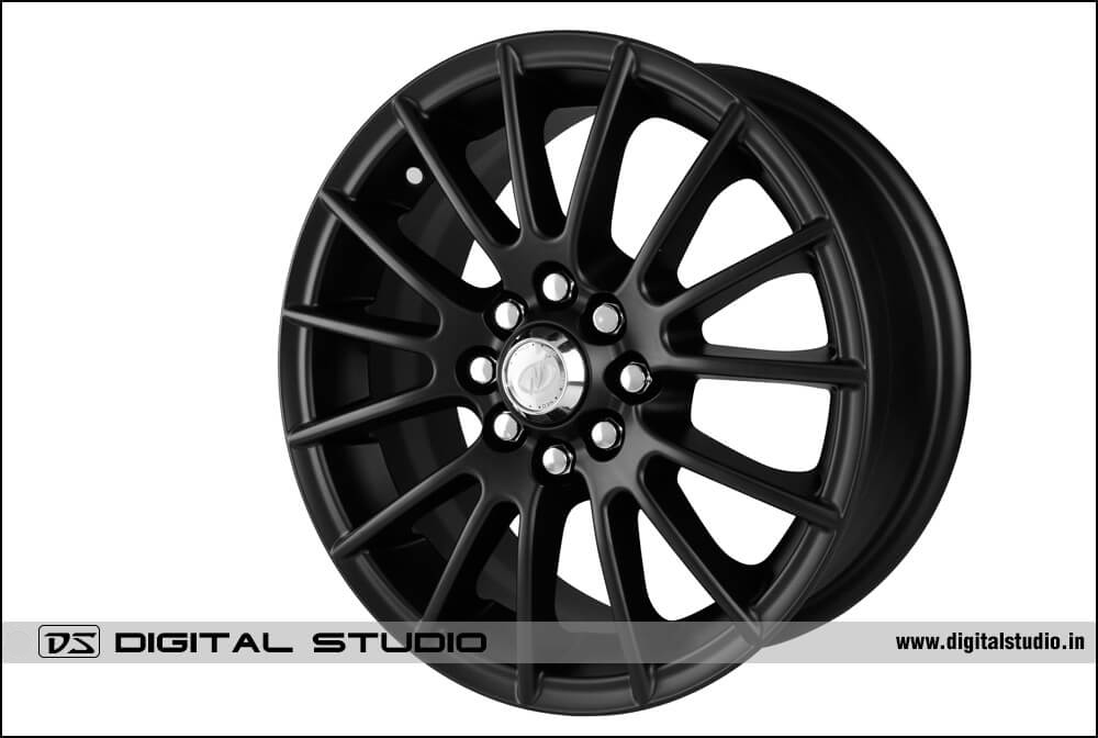 Photograph of black alloy wheel