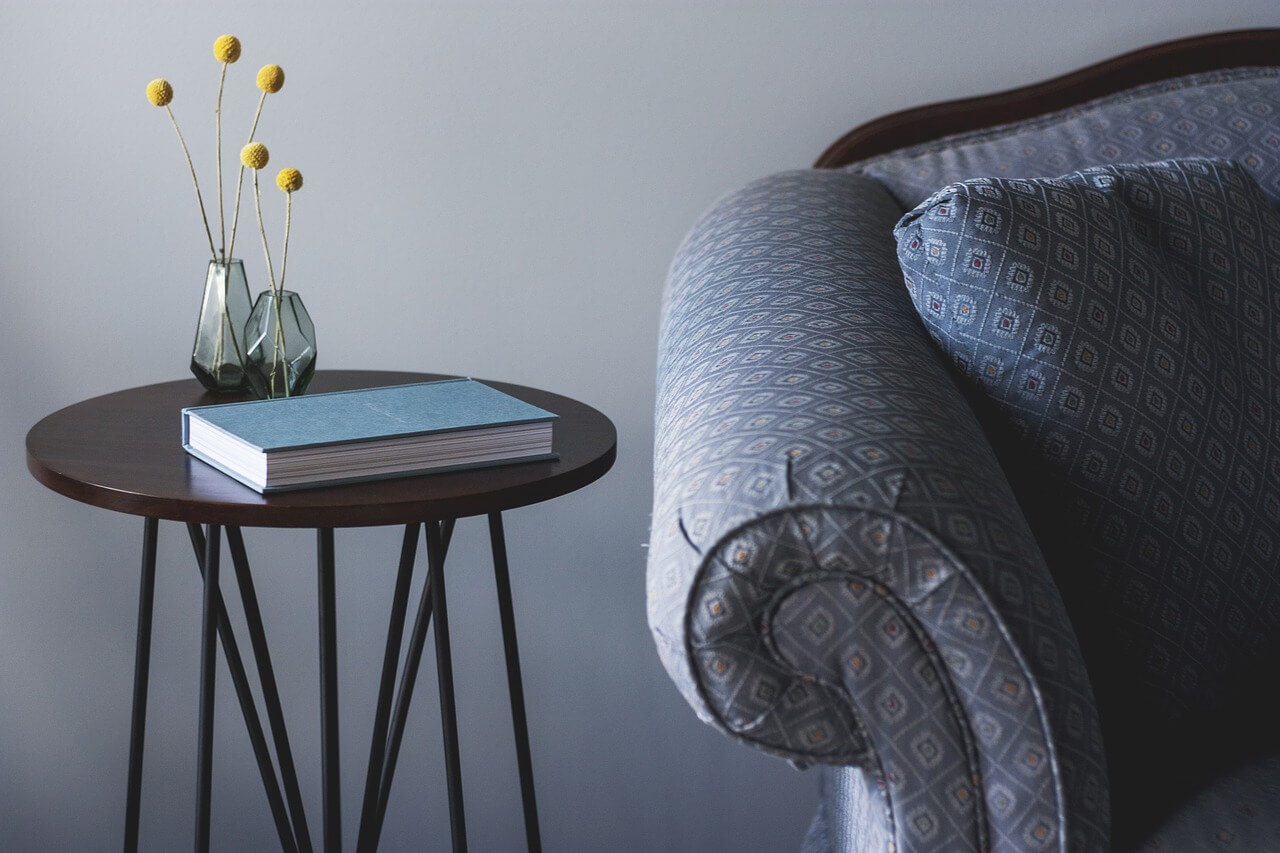 Chair with side table in a living room