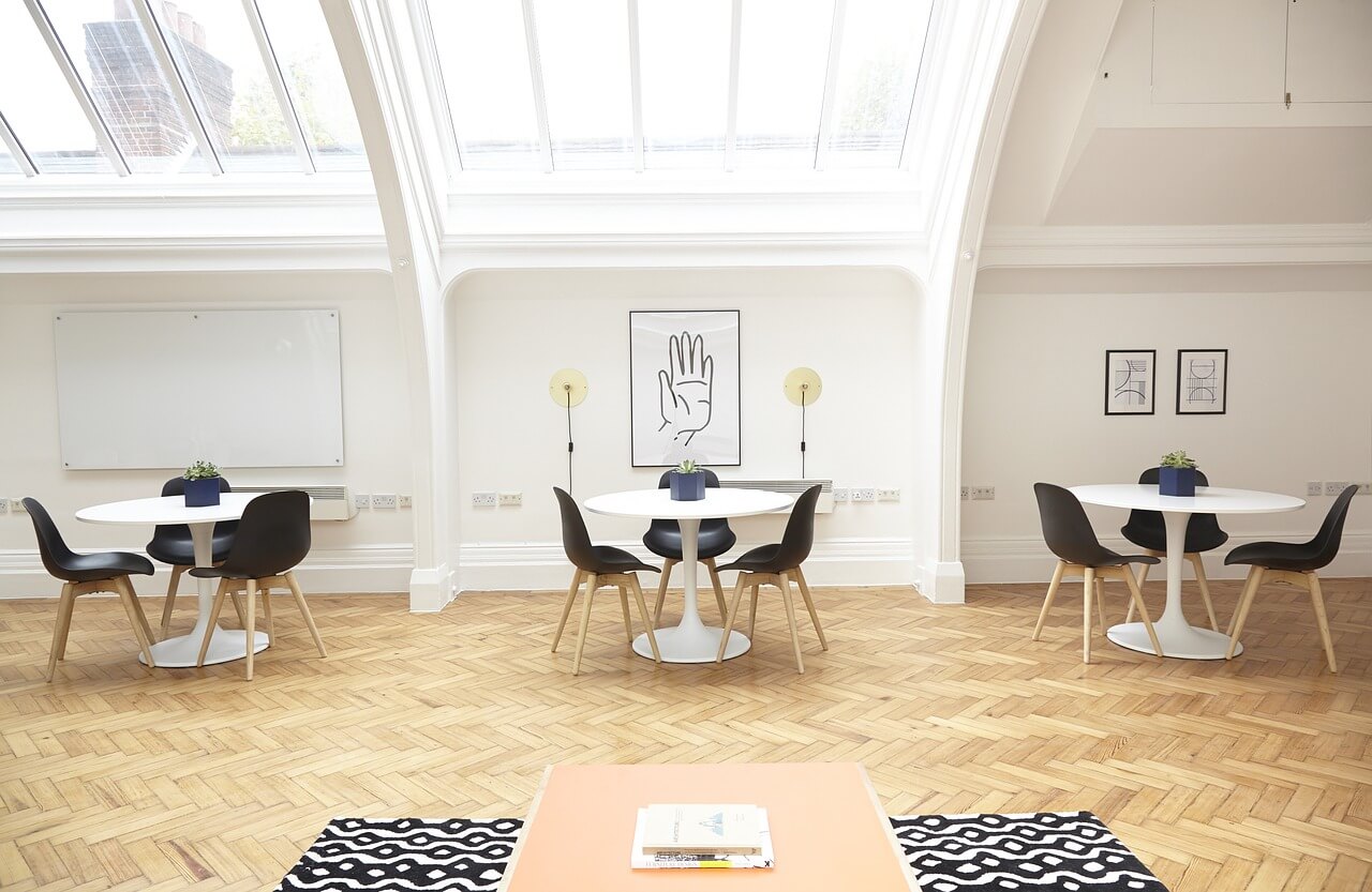 Three tea tables in a spacious living room