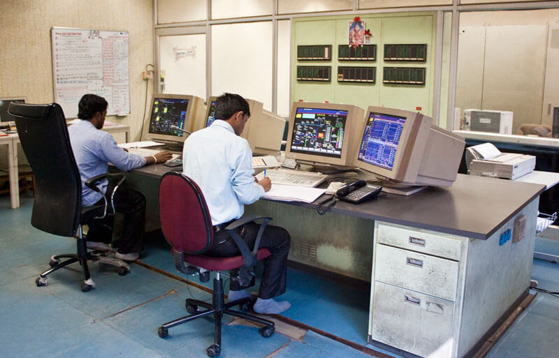 Staff working in  a petro chemical plant