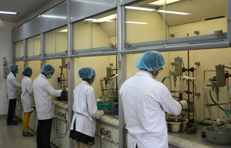 group of technicians working in a pharma plant