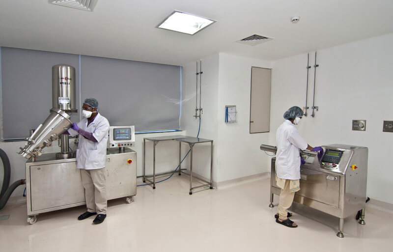 Lab technicians working in a pharma lab