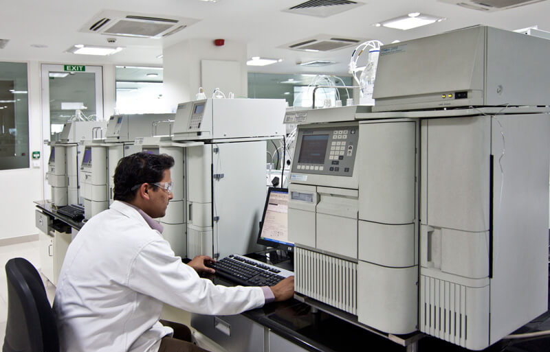Close-up angle photograph of lab with worker
