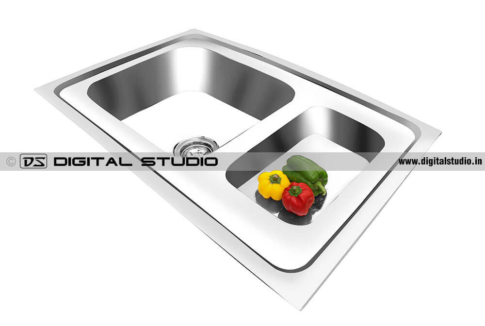 Angular photo of kitchen sink with props of vegetables