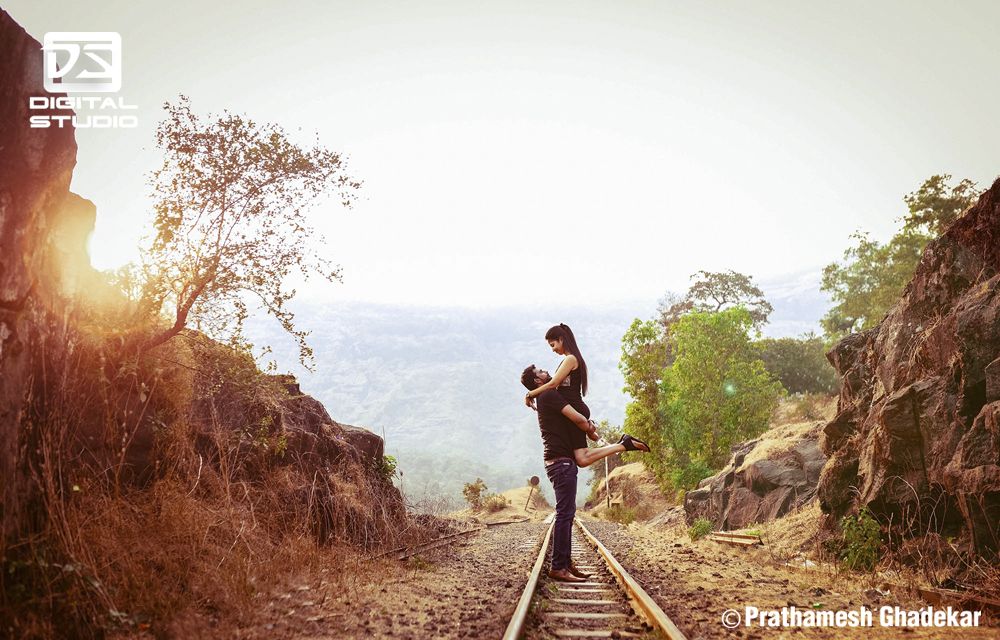 Couple on railway tracks