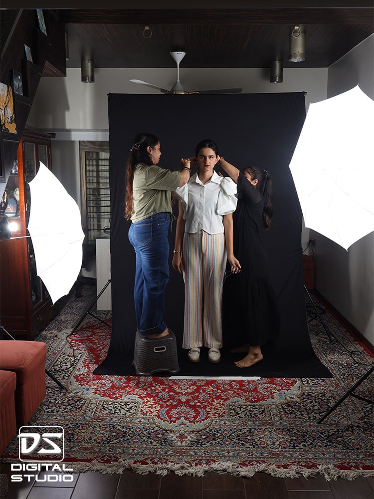 Hair and makeup artist with a model