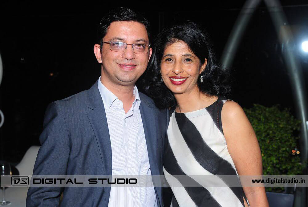 Couple smiling and enjoying at Cocktail dinner party