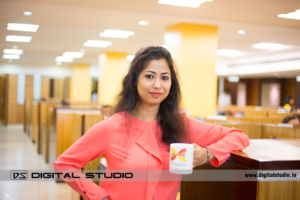 Lady office staff posing for photograph