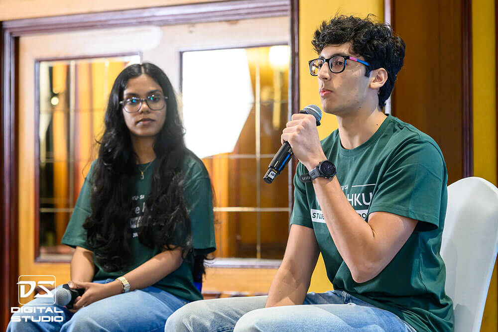 Student speaking on stage