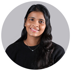 Professional LinkedIn headshot of a smiling woman photographed on-site at a corporate office in Mumbai.