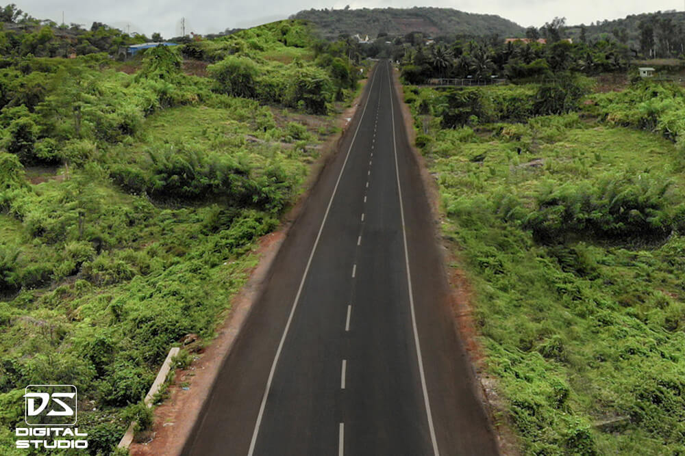 Drone documentation photograph of a state highway corridor on the Pen Khopoli route