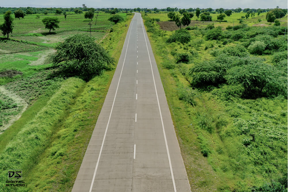 Drone documentation photograph of a newly constructed highway corridor on the Khamgaon Shegaon project