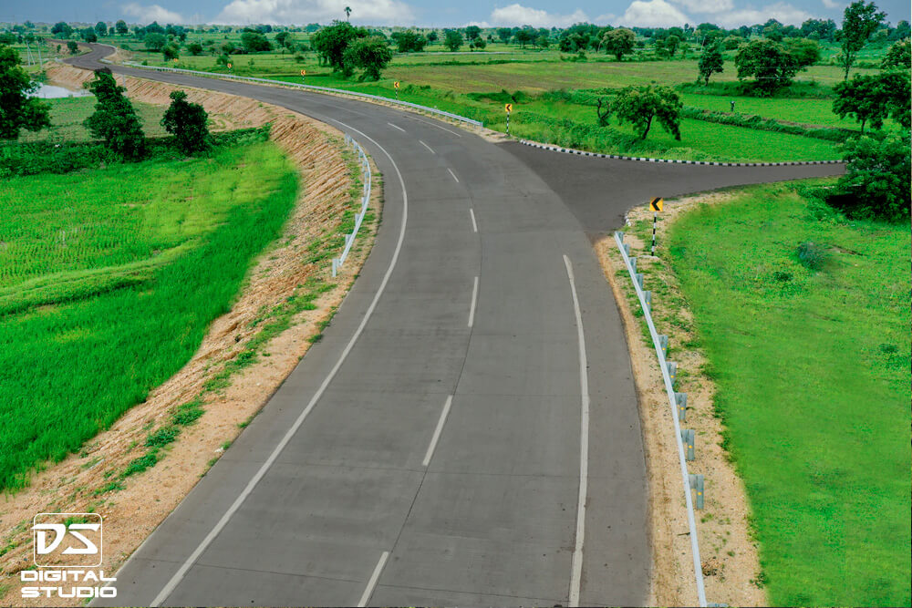 Drone documentation photograph of a curved highway section on the Umred Malewada corridor