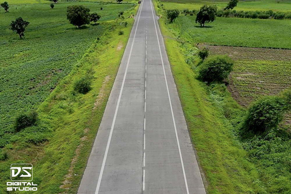 Drone documentation photograph of a concrete highway corridor on the Shegaon Deori route