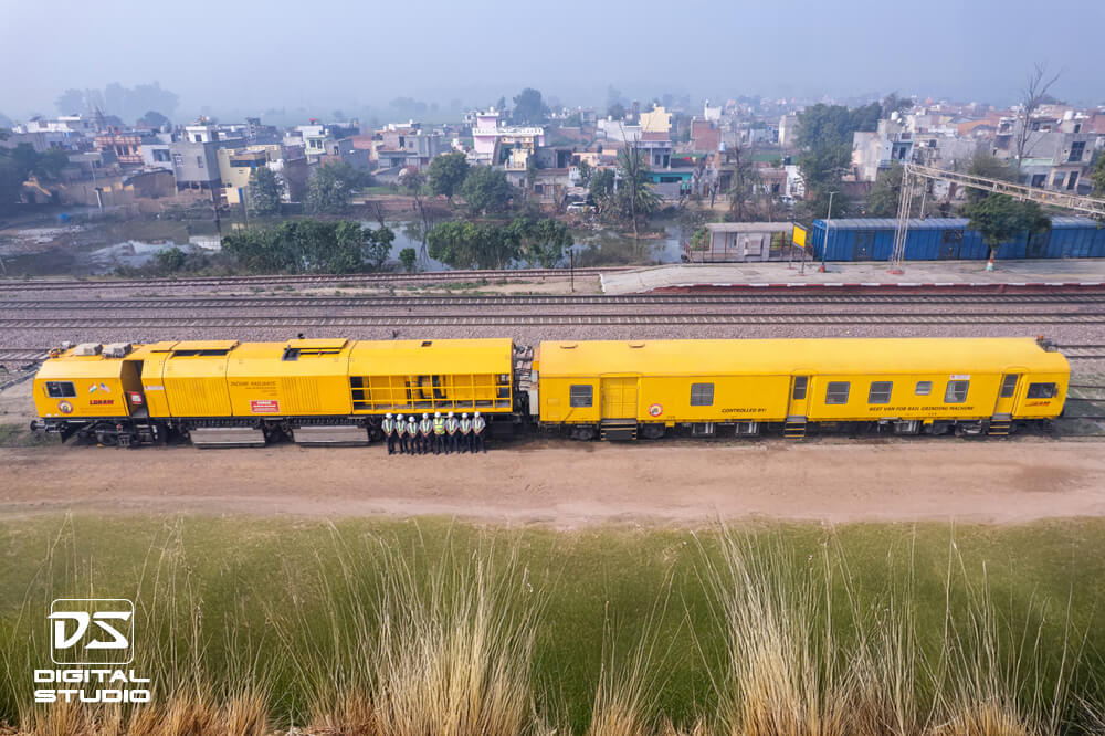 Staff lineup on the side of railway carriage
