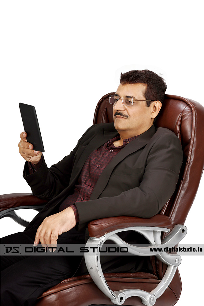 Executive reading kindle