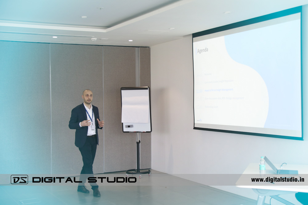German presenter in a business meeting