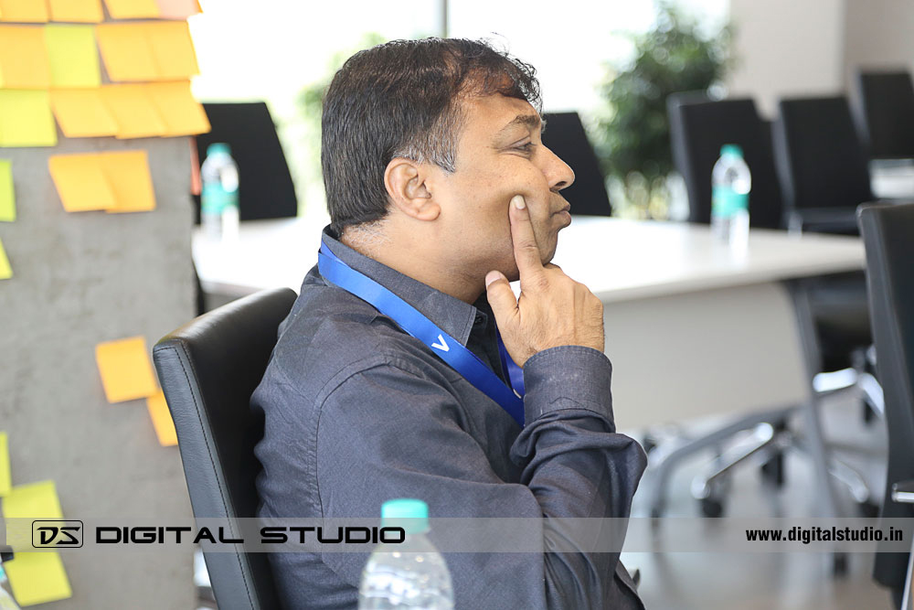 Indian Executive listening intently in  a business meeting