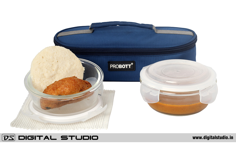 Glass lunch box with idli and sambhar