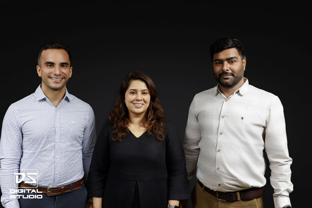 Group of office executives on black backdrop