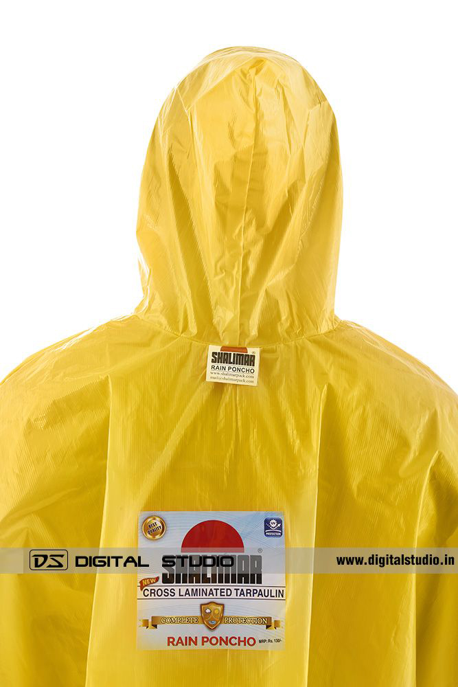 Close-up of yellow rain poncho