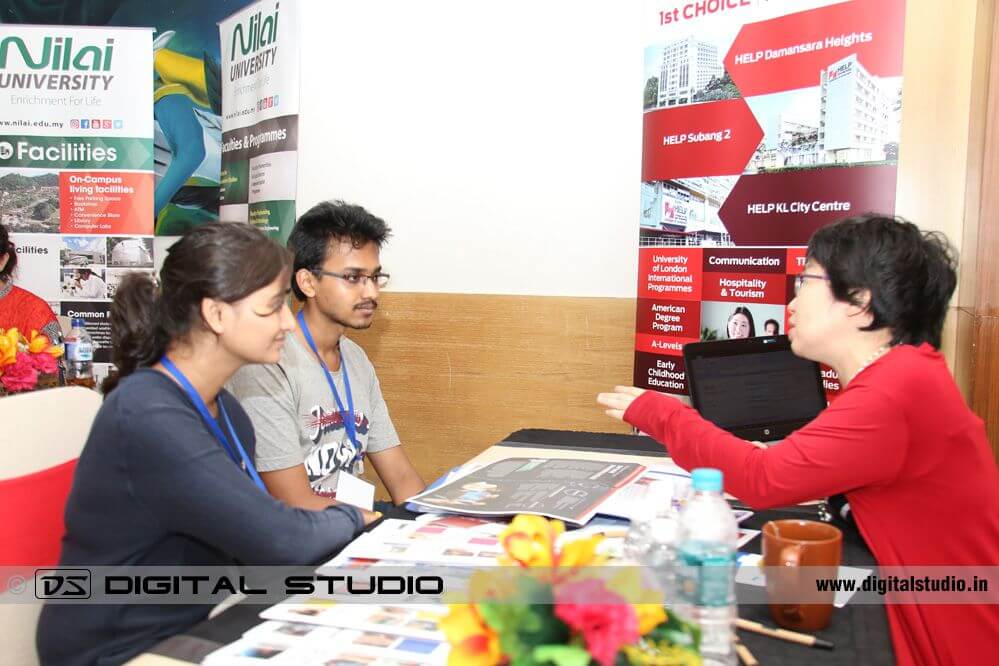 Counselor explaining courses to students