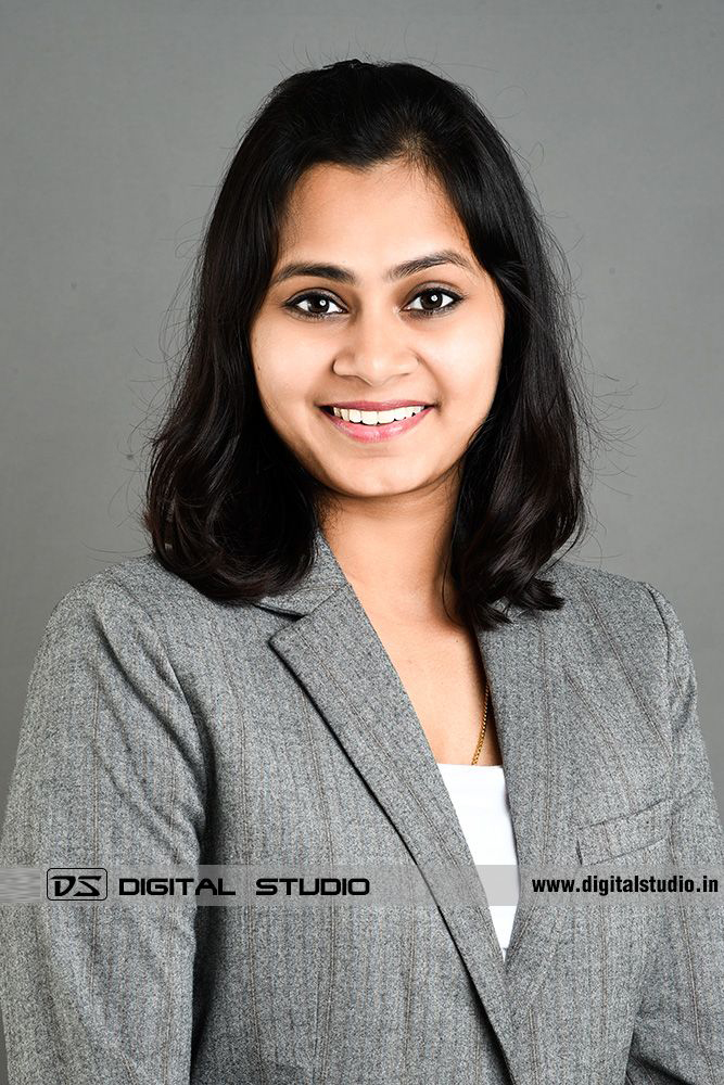 Young lady executive posing and smiling