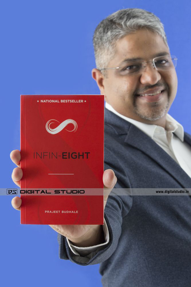 Author holding book