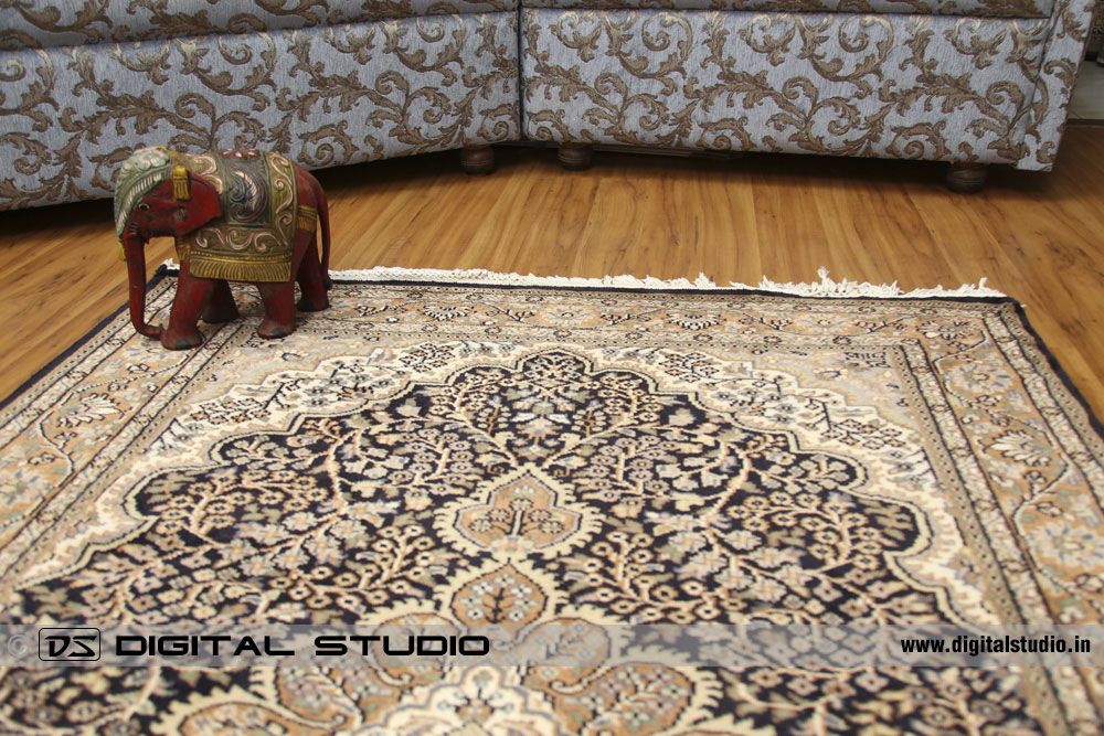 Oriental hand made carpet with elephant prop