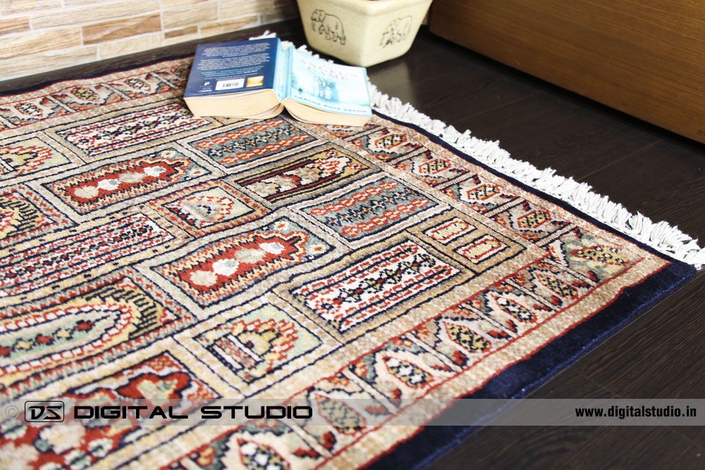 Oriental wool carpet on black wood floor