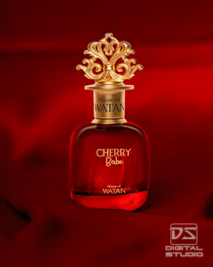 Actual creative studio photograph of a red glass perfume bottle styled against a rich red fabric background.