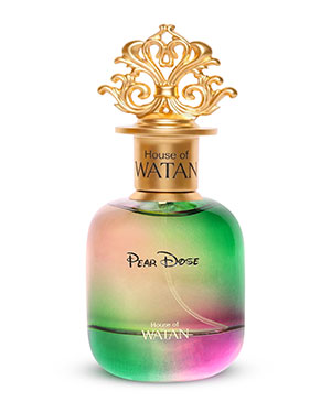 Real studio photograph of a premium perfume bottle featuring green and pink glass tones with an ornate gold cap.